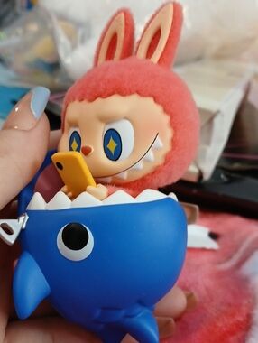 Pink Bunny Figure in Blue Shark Bowl with Yellow Phone